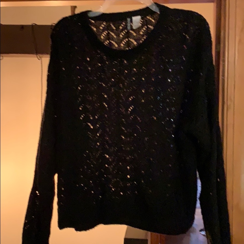 Divided black crochet sweater.  Size large